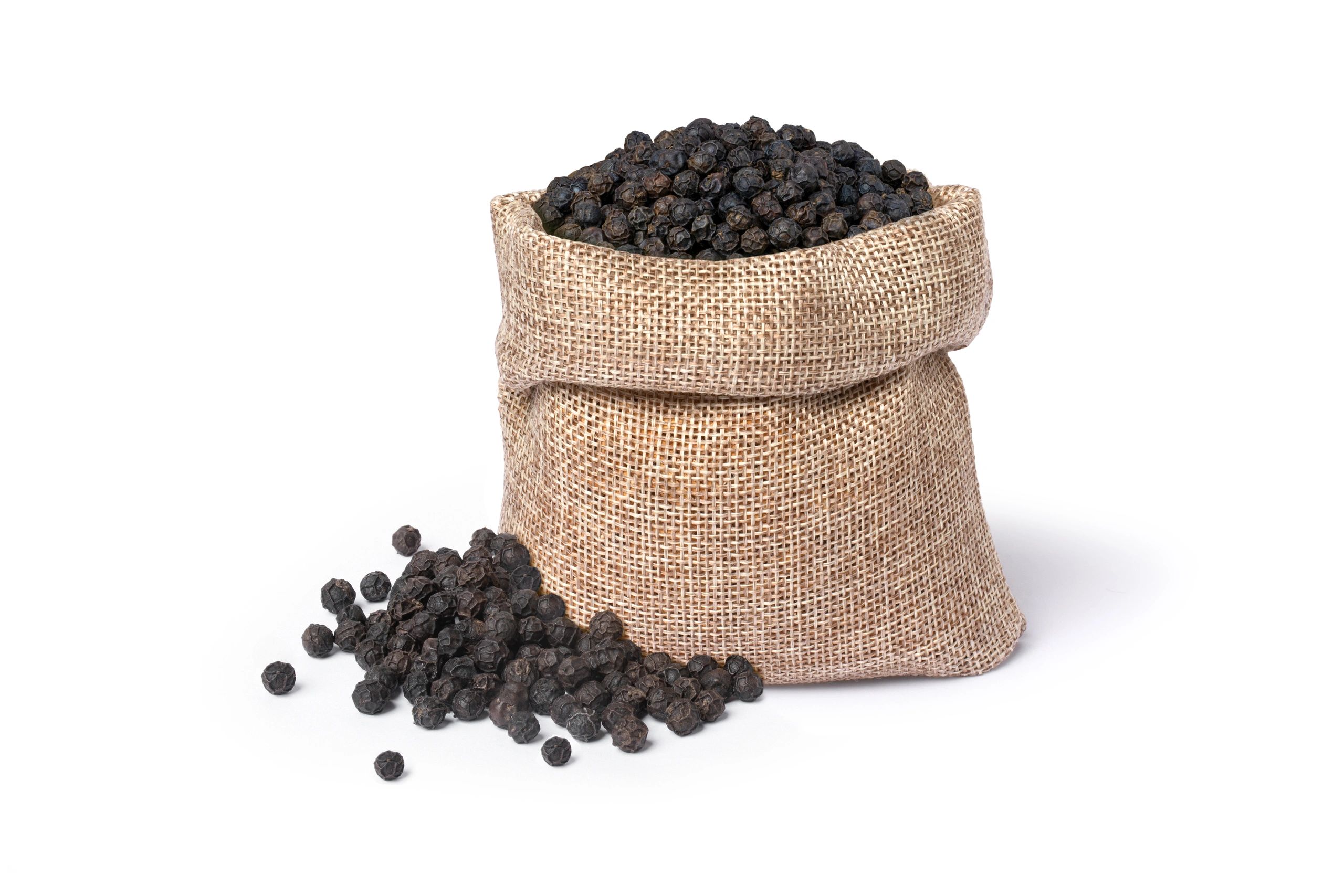Black peppercorns in a burlap sack