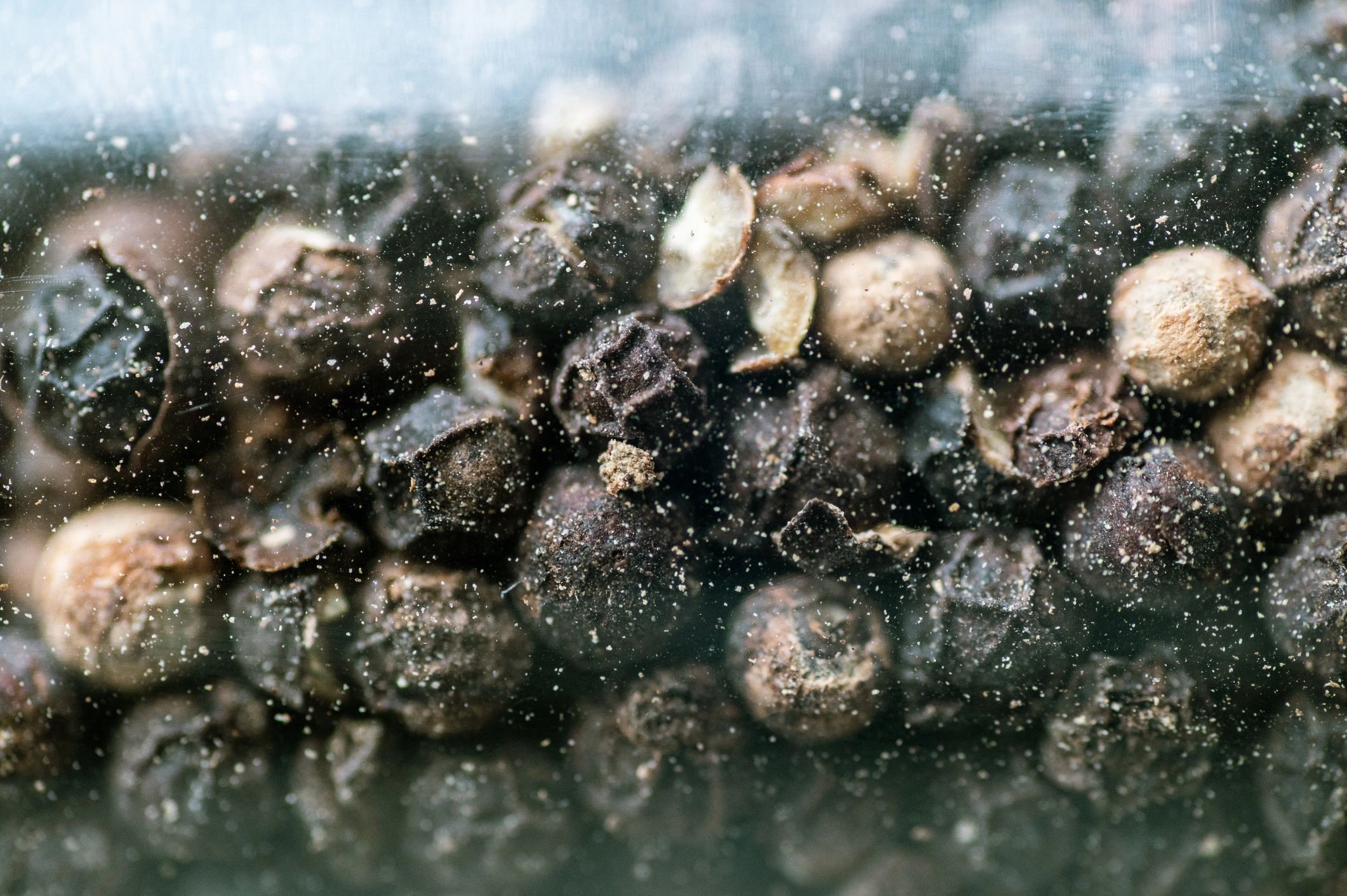 Close-up texture of black peppercorns